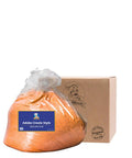 Bag of Adobo Creole Style seasoning with a branded box on a white background