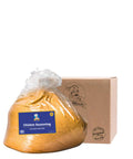 Bag of chicken seasoning with a cardboard box on a white background