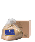 Bag of seasoned bread crumbs with a branded box on a white background